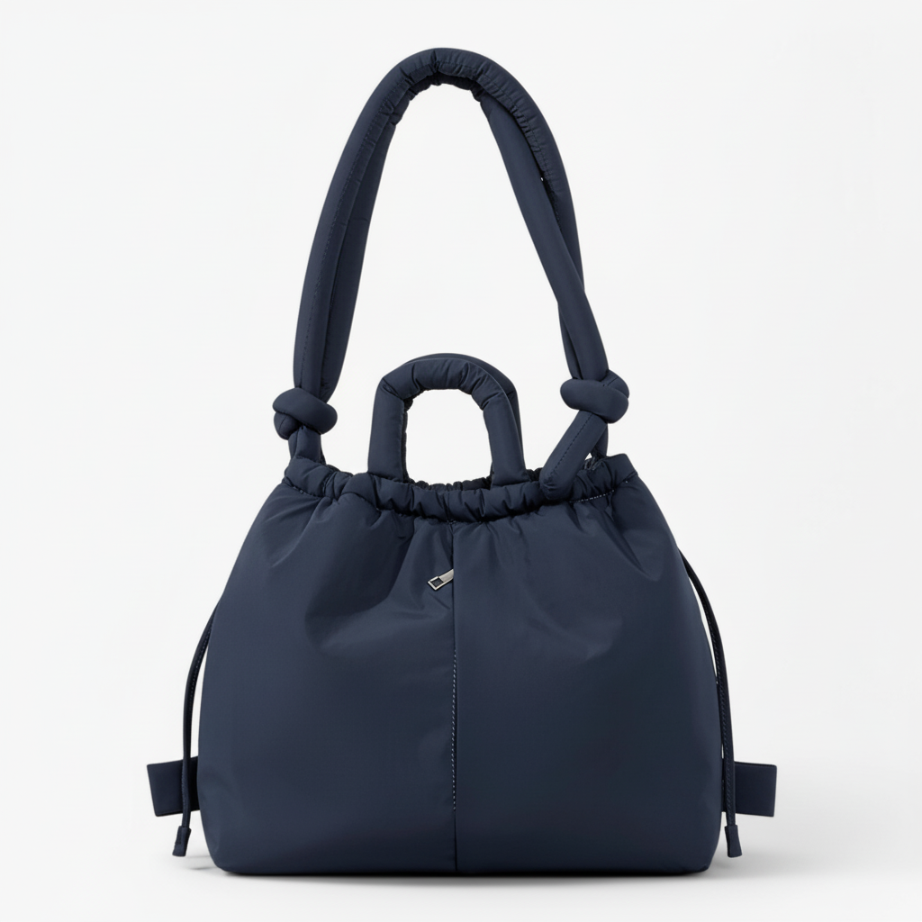 Navy blue quilted puffer bag